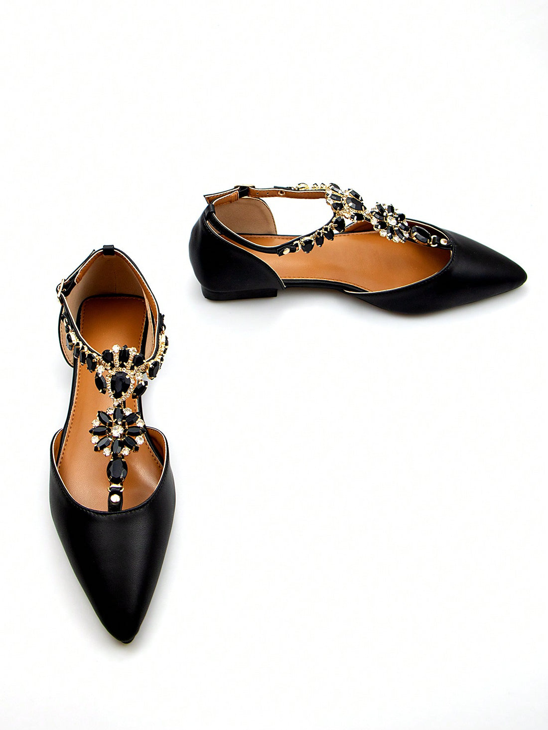 Experience elegance and comfort with Rhinestone Glamour: Women's Luxurious Hollow-Out Party Flats. Featuring intricate rhinestone detailing and a hollow-out design, these flats are perfect for any special occasion. Add a touch of glamour to your formal attire while enjoying the support and style of these flats.