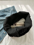 Side profile of Trendy Floral One-Shoulder Canvas Handbag for Female Students - Minimalist Cloud Bubble Design in Black color