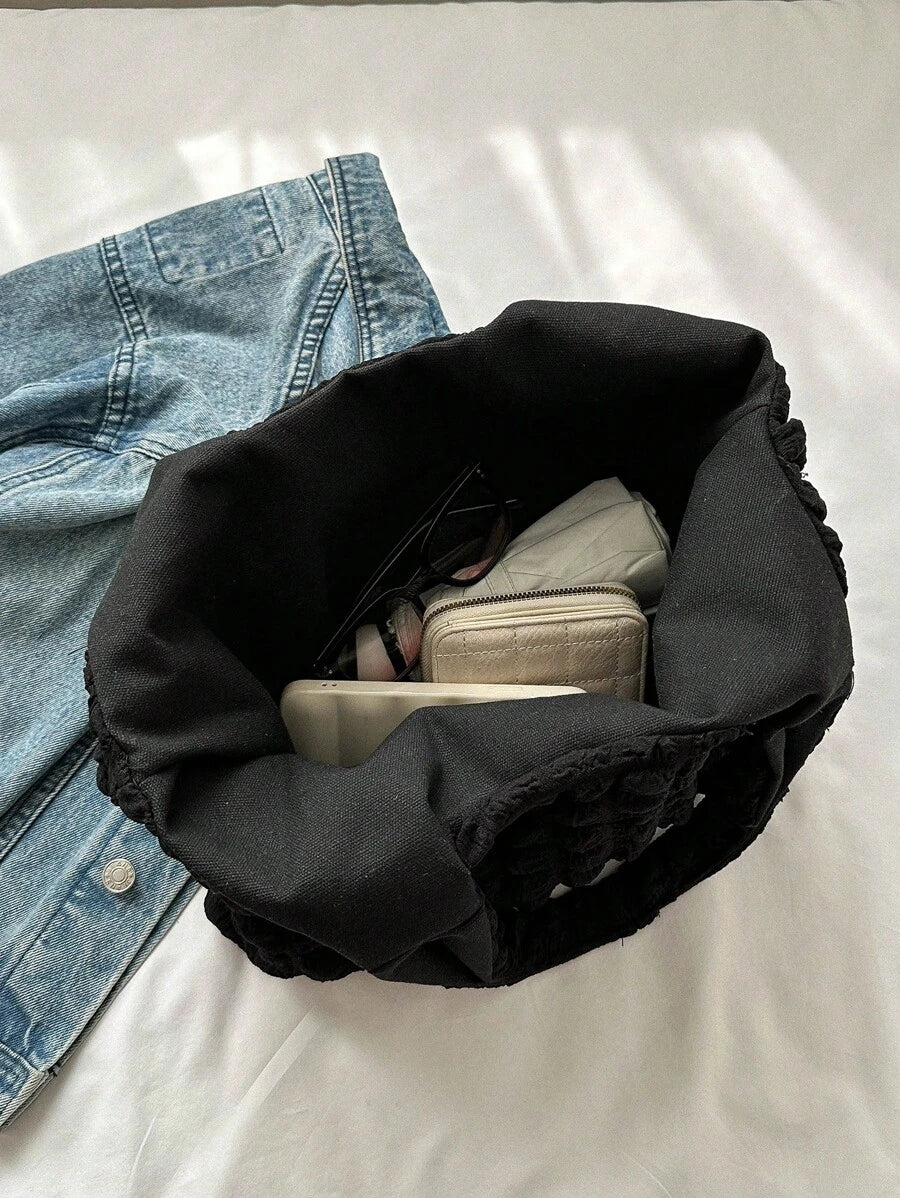 Side profile of Trendy Floral One-Shoulder Canvas Handbag for Female Students - Minimalist Cloud Bubble Design in Black color