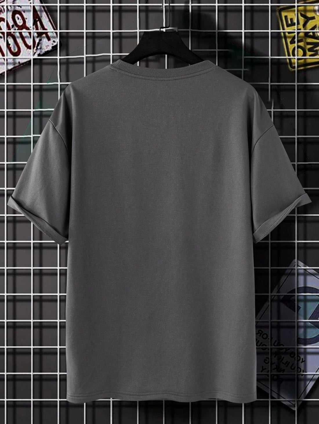 Discover a new level of style with our Men's Slogan Graphic Drop Shoulder Tee. Featuring bold graphics and a relaxed fit, this tee will elevate any outfit. Made with high-quality materials, it offers both comfort and style for the modern man. Upgrade your wardrobe today!