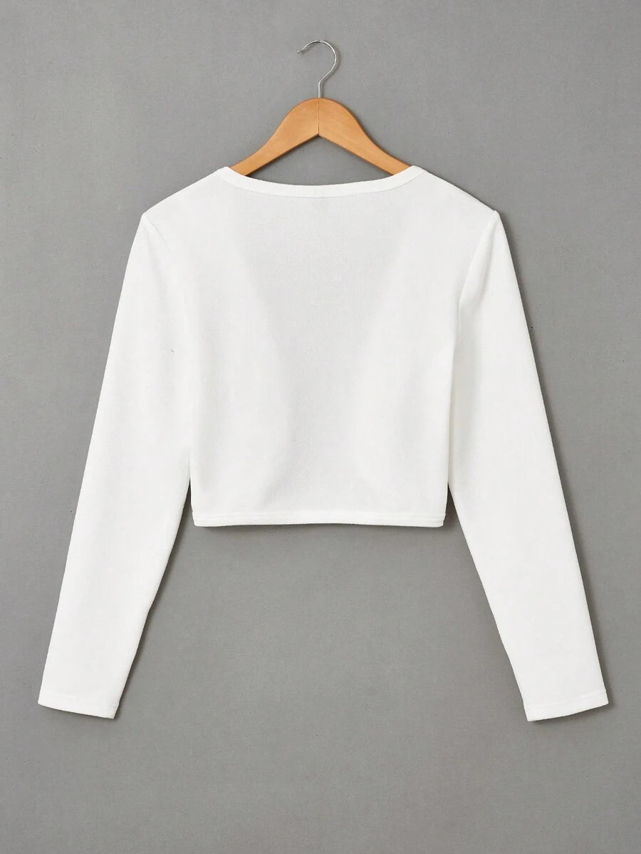 White cropped long sleeve open front bolero cardigan, front view