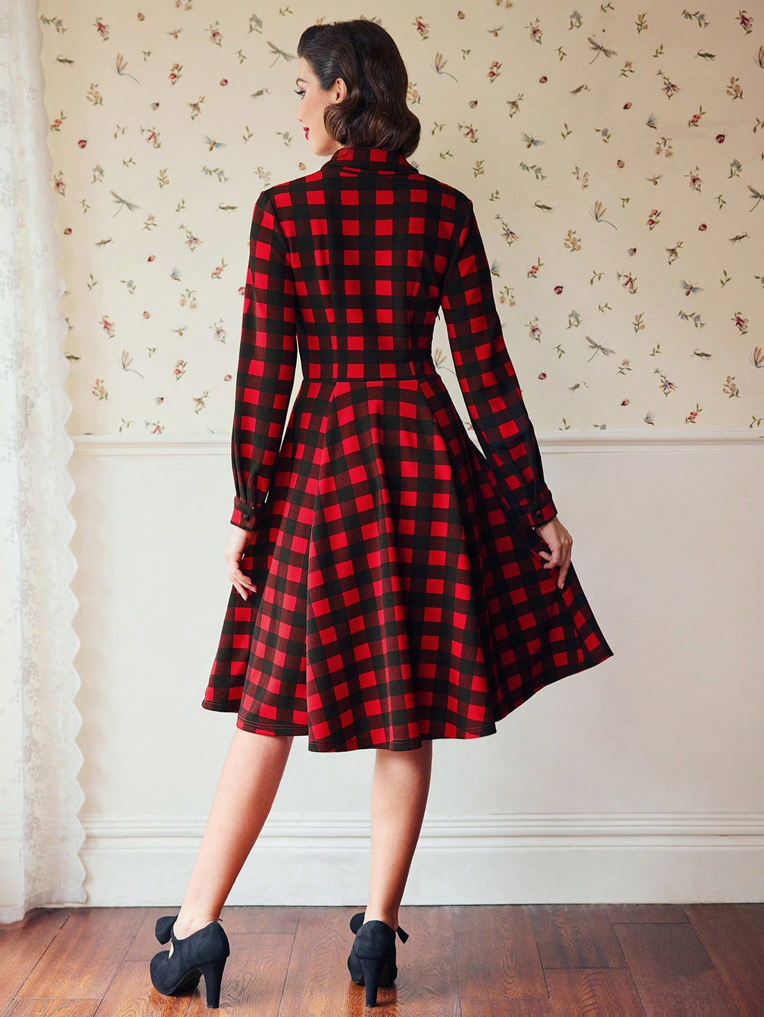 Get ready to rock your retro fashion game with the Buffalo Plaid Button-Front Flare Hem Dress! Its timeless charm effortlessly blends with cozy style, making it perfect for any occasion. Button it up for a chic look or unleash your playful side and pair it with your favorite statement piece.