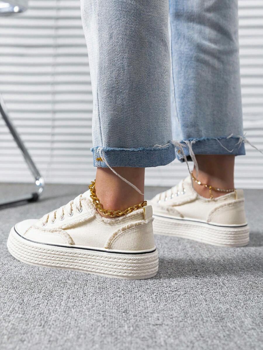 cream canvas platform sneakers image 2 showing visible color, material, toe, strap, heel, sole, or lace details