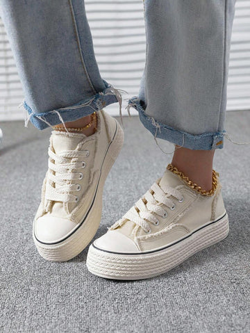 cream canvas platform sneakers image 1 showing visible color, material, toe, strap, heel, sole, or lace details