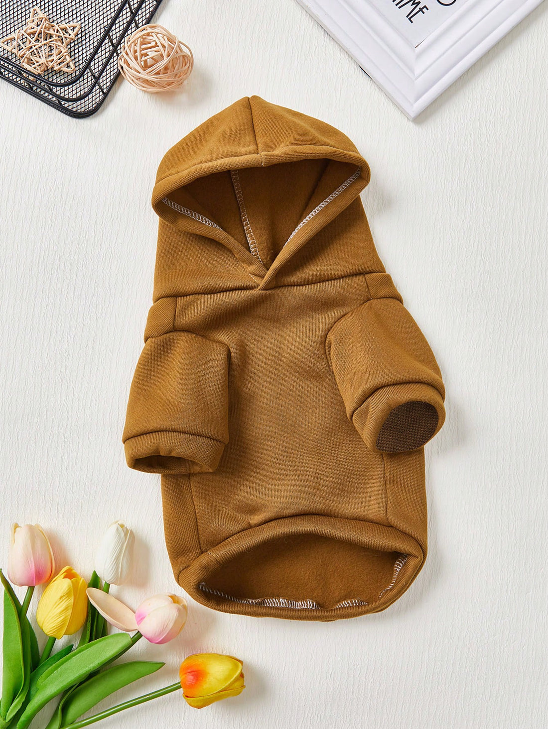 Keep your furry friend warm and fashionable with our Cozy and Stylish Pet Sweatshirt. Featuring a letter print and hood, this sweatshirt is not only cute but also functional. Made with high-quality materials, it will provide your pet with the ultimate comfort and warmth. Perfect for chilly days and walks in the park.