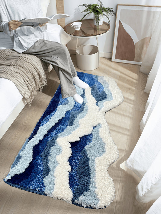 Transform your bathroom into a stylish retreat with our Wave Cloud Patterns 3D Irregular Shape Bathroom <a href="https://canaryhouze.com/collections/rugs-and-mats" target="_blank" rel="noopener">Rug</a>. Made with soft plush material, this modern carpet adds a touch of comfort and luxury to your teenage aesthetic room decor. The 3D wave and cloud patterns create a unique and eye-catching design, perfect for any modern bathroom.