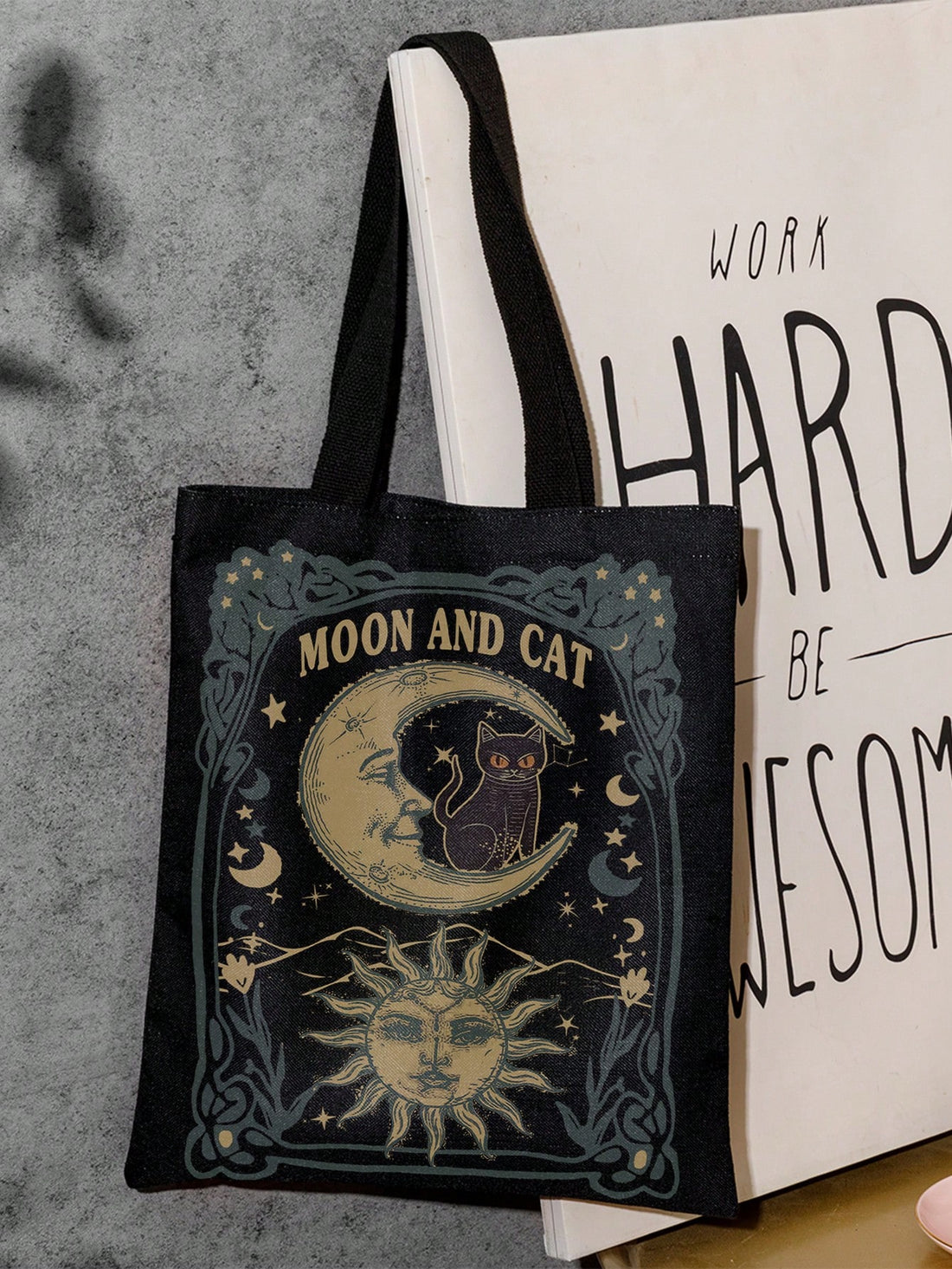 Elevate your everyday style with our Enchanting Moon Cat Graphic Shopper Bag! Perfect for casual fairycore looks, this bag features an eye-catching moon cat graphic that adds a touch of magic to any outfit. Made with durable materials, it's both practical and stylish.