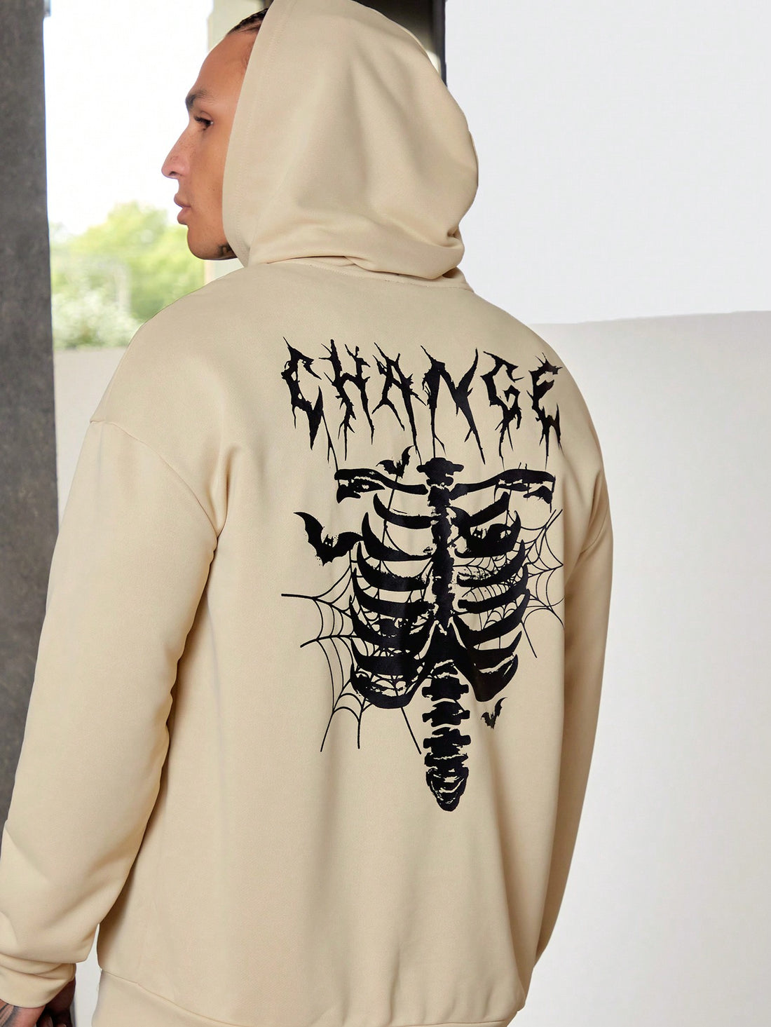 Stay stylish and comfortable with our Men's Skeleton Print Drop Shoulder Hoodie. With its unique skeleton print and drop shoulder design, this hoodie is both fashionable and comfortable. Made with high-quality material, it's perfect for any casual occasion. Elevate your wardrobe with this must-have hoodie.