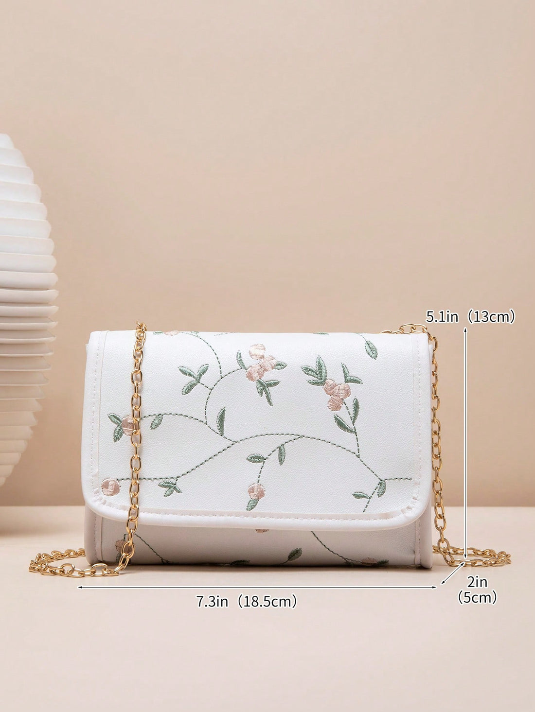 Introducing the Chic Square Shoulder Bag: the perfect addition to any stylish woman's wardrobe. With its versatile crossbody design, this bag offers both fashion and functionality. Made with high-quality materials and featuring a chic square shape, it's the perfect accessory for any occasion. Upgrade your look today!