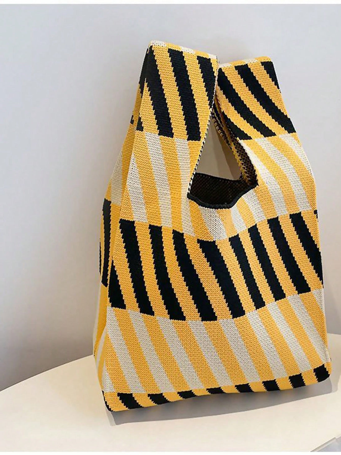 Introducing Sunshine Stripes, the perfect accessory for girls and ladies! This lightweight and foldable shoulder bag offers both fashion and functionality. With its stylish striped design and convenient foldable feature, it's perfect for everyday use or travel. Stay organized on the go with this must-have bag.