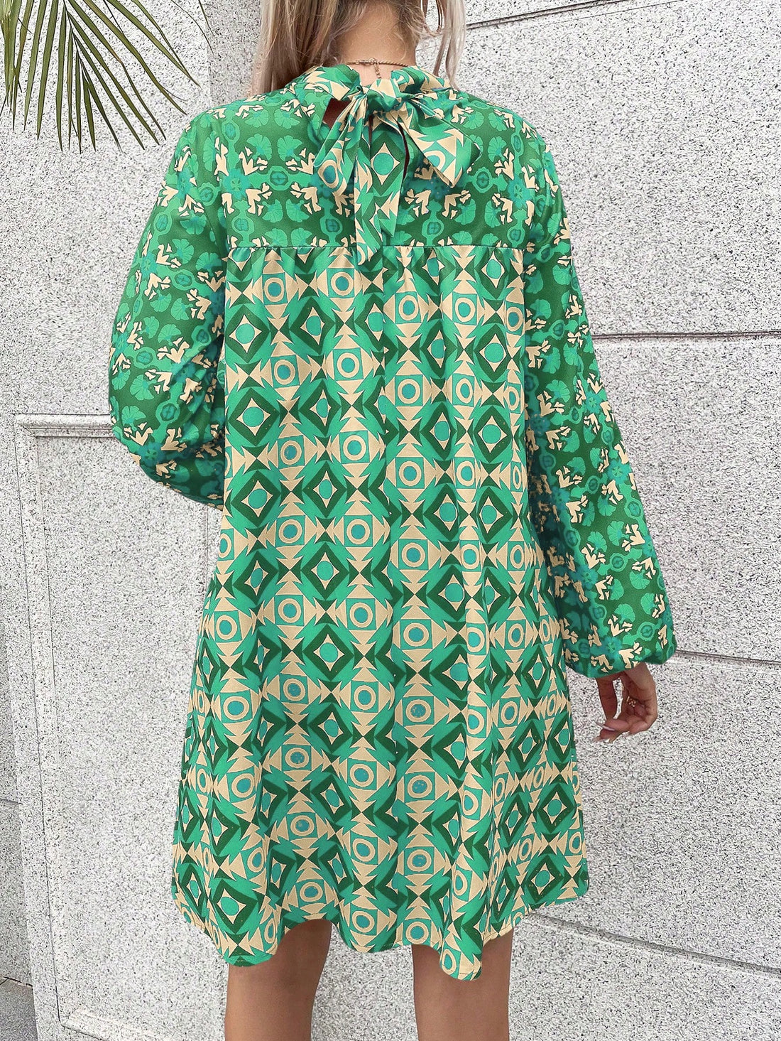 Introducing our Chic Allover Print Mock Neck Lantern Sleeve Dress – the perfect choice for effortless elegance at any occasion. Featuring a chic allover print, mock neck, and lantern sleeves, this dress will take your style to the next level. Stay on-trend and make a statement with this must-have dress.