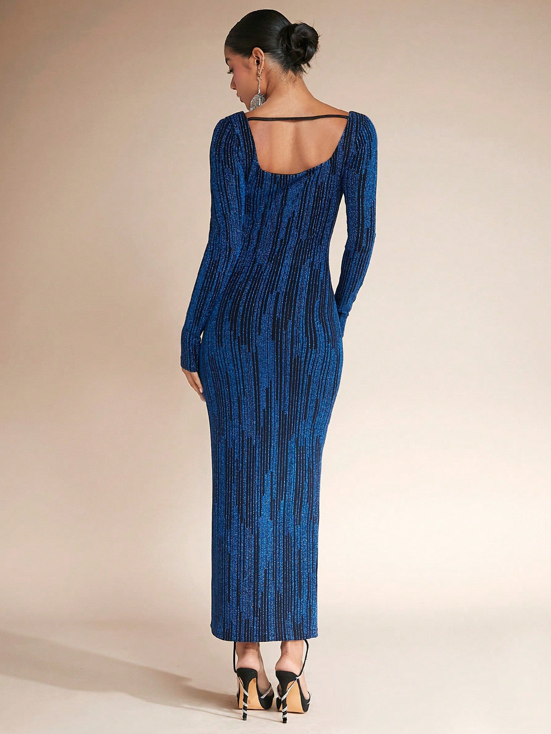 Unleash your inner spark with our Sparkling Elegance bodycon dress! Features a flattering square neck and shimmering glitter fabric for a truly glamorous look. Perfect for any special occasion, this dress is sure to make you shine and turn heads wherever you go. Elevate your style and confidence with Sparkling Elegance!