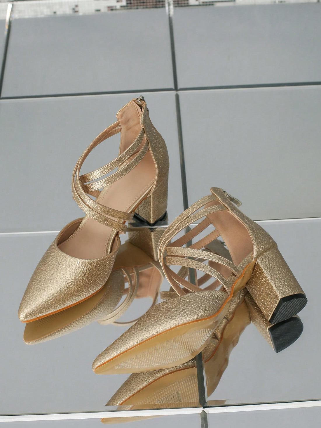 Get ready to strut your stuff in these sleek high heels! Featuring a stylish cross-strap design and back zip detail, these heels will elevate any outfit. Slip them on and step out in style (and comfort!). Perfect for any occasion, from a night out to a day at the office!