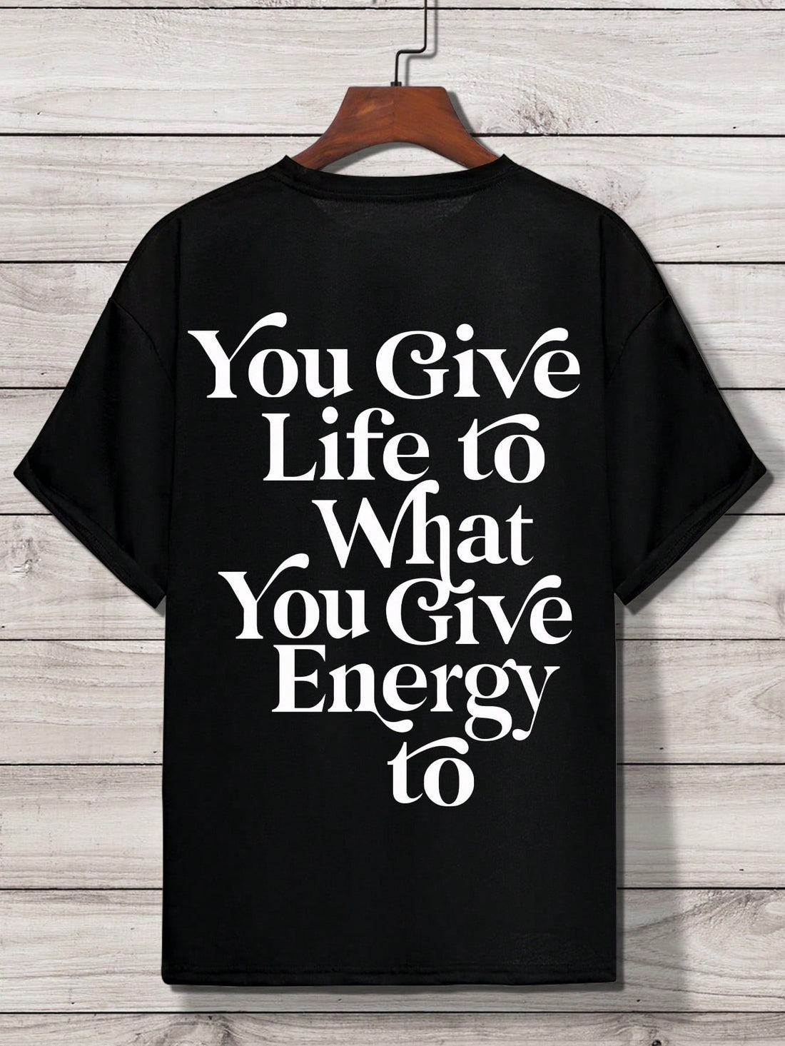 Make a statement without saying a word in our Extra Loose Slogan Graphic Tee. With its trendy drop shoulder design and eye-catching graphics, this t-shirt brings attitude to your casual wardrobe. The relaxed fit gives you room to move, breathe, and turn heads. Perfect for those days when your style needs to do the talking!