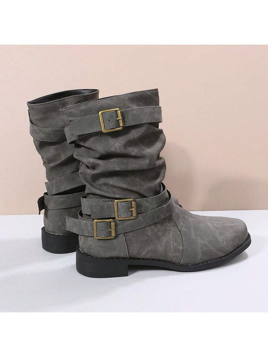Experience vintage style and modern comfort with Vintage Chic's Women's Gray Motorcycle Boots. The pointed toe and flat heel are perfect for everyday wear, while adding a touch of edginess to any outfit. Made with high quality materials, these boots are a must-have for any fashion-forward woman.