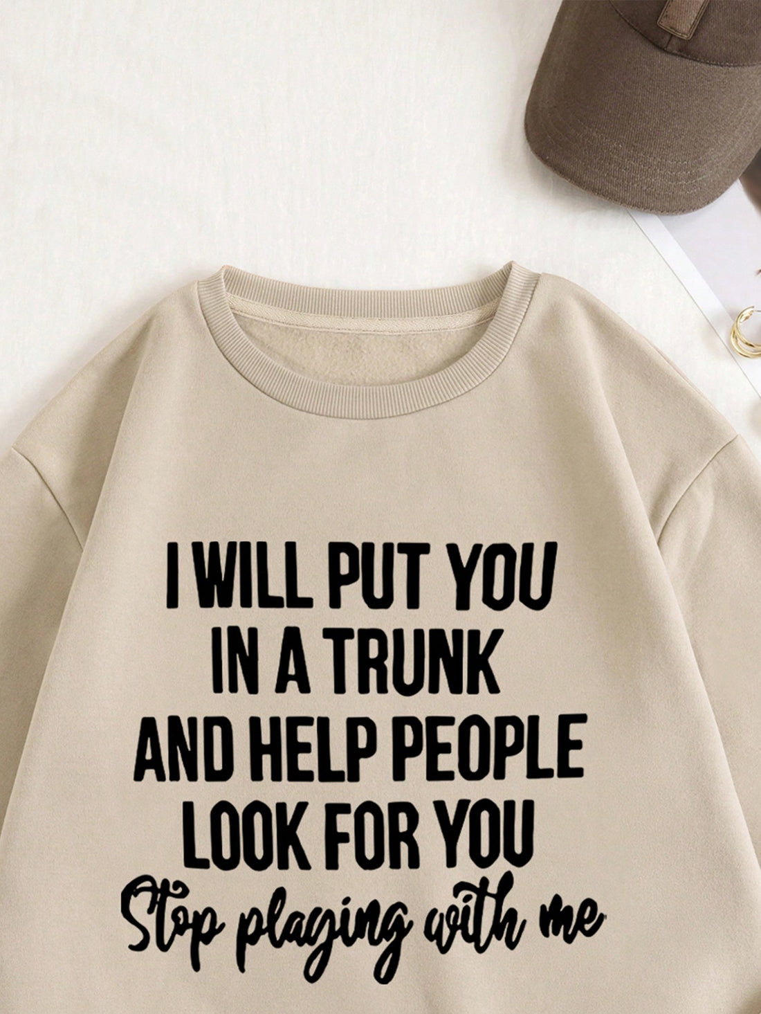 Stay warm and make a statement with our I Will Put You in a Trunk Sweatshirt. Featuring a bold graphic and thermal lining, this sweatshirt will keep you cozy and stylish. Perfect for those who want to stand out while staying comfortable.