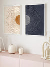 Elevate your home decor with the Dreamy Celestial Duo art prints. These mid-century bohemian designs feature a stunning combination of the moon and sun, adding a dreamy and celestial touch to any room. Made with high-quality materials, these prints will enhance your modern aesthetic in a unique and stylish way.