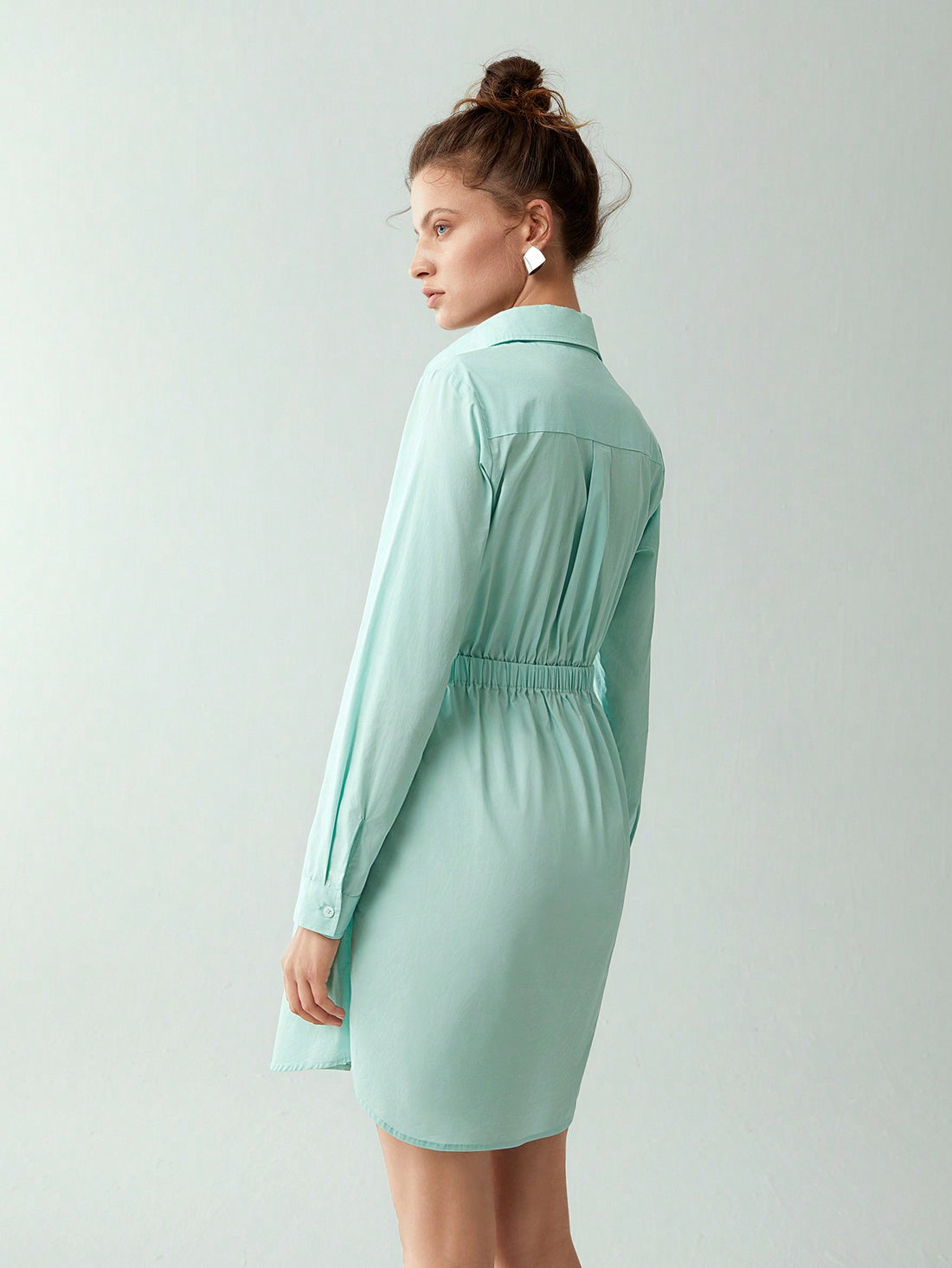 Unleash your timeless elegance with this Chic Solid Button-Front Belted Shirt Dress. The perfect combination of style and versatility, this dress offers endless outfit possibilities with its belted design and classic button-front. Elevate your wardrobe with this must-have piece!