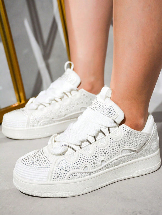 Introducing the Sparkle and Shine: Rhinestone Covered Low-Cut <a href="https://canaryhouze.com/collections/women-canvas-shoes?sort_by=created-descending" target="_blank" rel="noopener">Sneakers</a>. These stylish sneakers are covered in rhinestones for a unique and eye-catching look. Perfect for any fashion-forward individual looking to add some sparkle to their shoe collection. Stand out from the crowd with these dazzling sneakers.