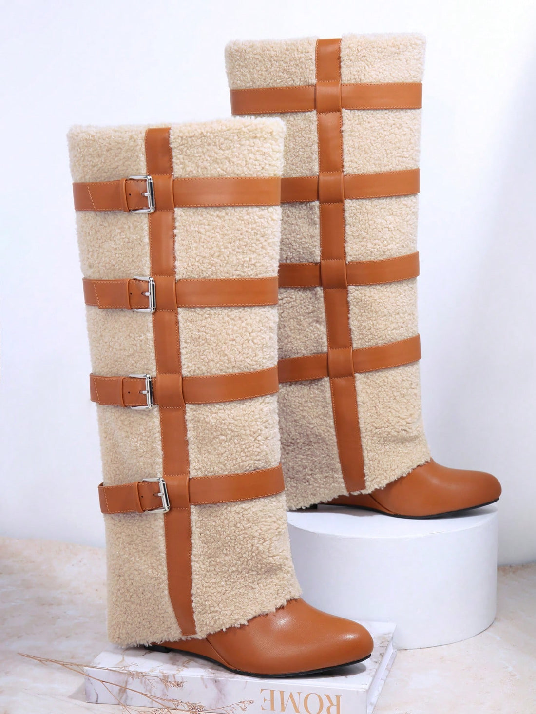 These knee-high boots are a must-have for any fashion-forward individual. Made with high-quality faux leather, they offer a sleek and stylish look while also providing comfort and durability. Perfect for any trendy outfit, these boots are sure to make a statement wherever you go.