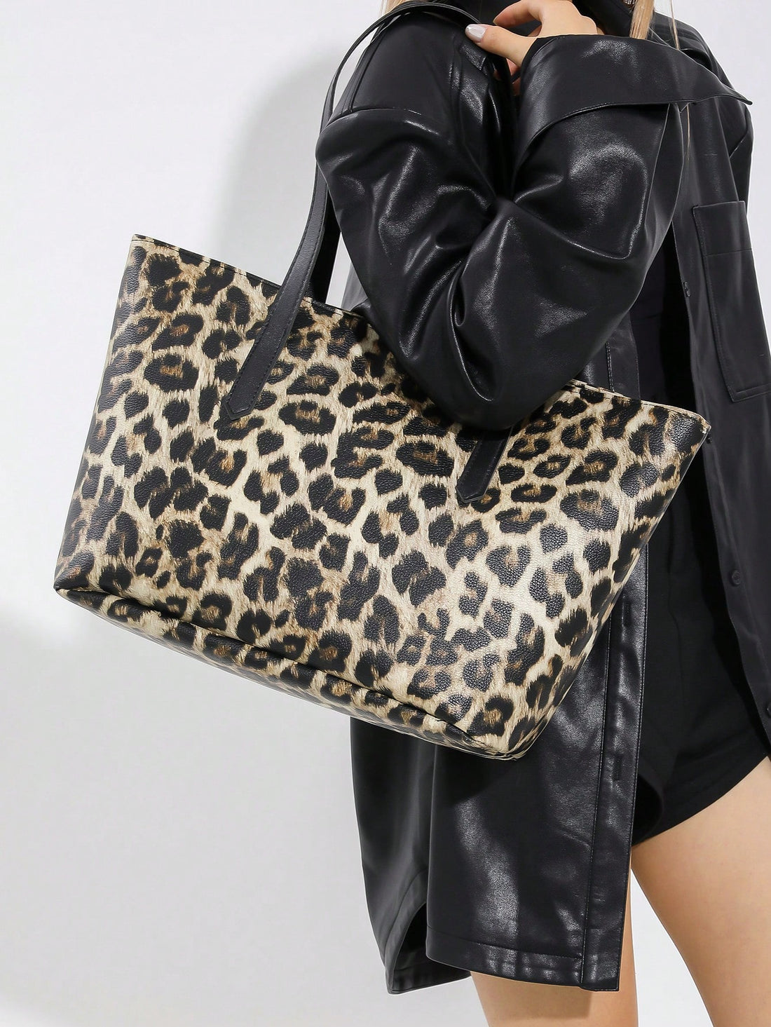 Upgrade your style with our Vintage Leopard Print 3-Piece Bag Set. Expertly crafted to provide stylish solutions for every occasion, this set includes three bags of varying sizes, perfect for any outing. Stand out from the crowd with the timeless leopard print design.