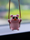 Add a touch of fun and personality to your car interior with our Adorable Swinging Pig Car Mirror Pendant. Guaranteed to bring a smile to your face every time you hop in your car, this pendant is the perfect accessory for any car lover. Invest in some joy for your daily commute today!