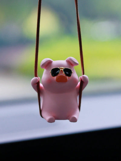 Add a touch of fun and personality to your car interior with our Adorable Swinging Pig Car Mirror Pendant. Guaranteed to bring a smile to your face every time you hop in your car, this pendant is the perfect accessory for any car lover. Invest in some joy for your daily commute today!