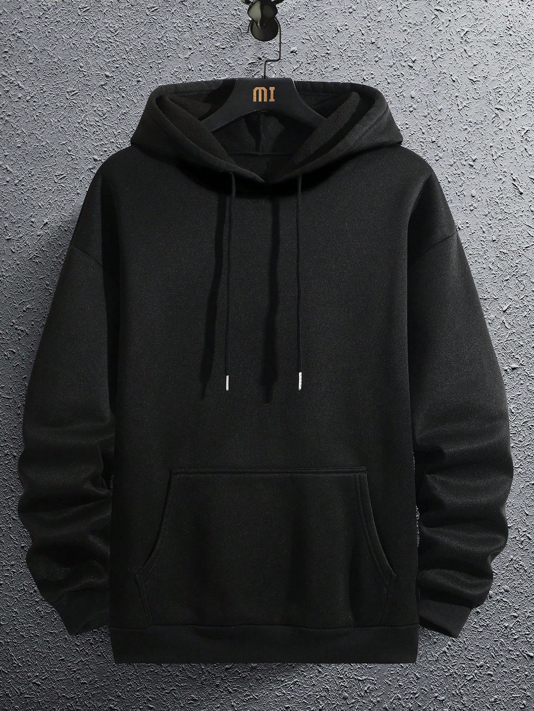 Unleash your edgy side with our Men's Skull Letter Graphic Drop Shoulder Hoodie. This stylish and comfortable hoodie features a bold skull graphic, making it a perfect choice for those who like to stand out. Embrace your dark side in style with this must-have piece for any fashion-forward man.