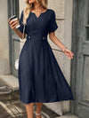 Chic and Classic: Notched Neckline A-Line Dress with Button Detail