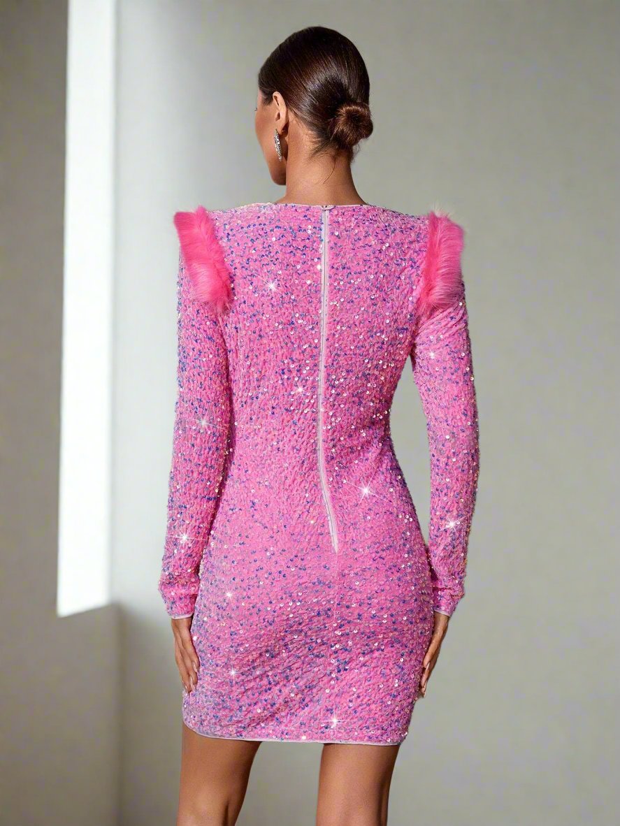 Introducing the Sequin Sparkle Pink Fuzzy Trim Bodycon Dress, perfect for adding some shimmer and texture to your wardrobe. The sequin sparkle catches the light, while the soft fuzzy trim adds a touch of elegance. This dress is sure to make you stand out at any event.
