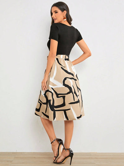 A Stylish Statement Piece with Geometric Graphic Print Belted Dress