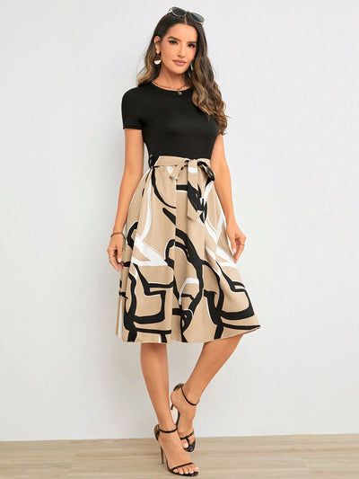 A Stylish Statement Piece with Geometric Graphic Print Belted Dress