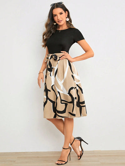 A Stylish Statement Piece with Geometric Graphic Print Belted Dress