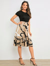 A Stylish Statement Piece with Geometric Graphic Print Belted Dress