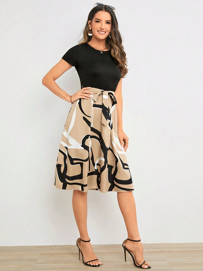 A Stylish Statement Piece with Geometric Graphic Print Belted Dress