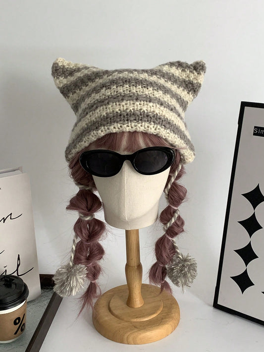 Stay warm and stylish this season with our Fuzzy Striped Rabbit Ear Winter Hat. Made from cozy materials, this autumn beanie is suitable for both women and men. The cute rabbit ear design adds a playful touch to your winter wardrobe. Stay cozy with style.