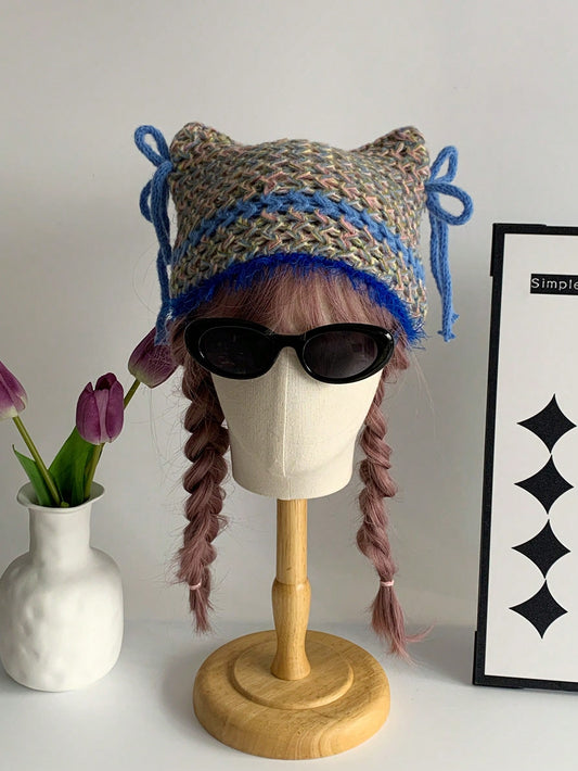This colorful vintage handmade horned beanie features a trendy mixed color bowknot design, adding a touch of charm to your winter wardrobe. Made with expert craftsmanship and high-quality materials, it not only keeps you warm but also effortlessly elevates your style. Embrace the best of both worlds with this stylish and functional beanie.