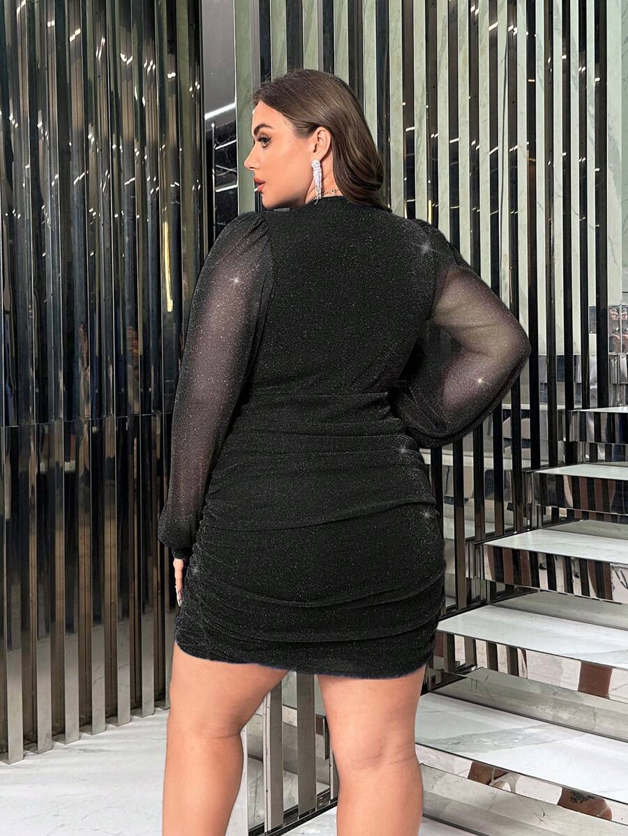 Turn heads effortlessly in this Elegant Plus Size Shiny Pleated Wrap Dress. Its shimmering fabric and flattering pleats celebrate your curves with playful charm, while the wrap design offers a comfortable, adjustable fit. Perfect for making every occasion feel extra special and fun.