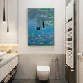 Light wood framed whimsical black cat pond canvas wall art in a modern bathroom