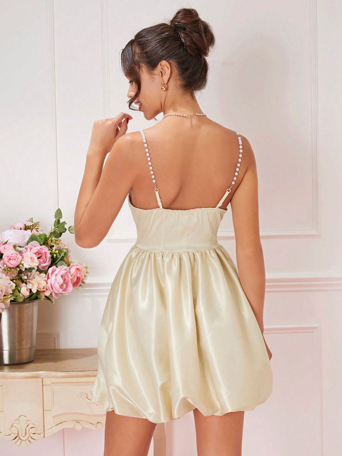 Effortlessly exude elegance with our Chic Frill Trim Cami Dress! Perfect for any occasion, this dress features feminine frill trim and a flattering cami design. Elevate your style with ease and grace.