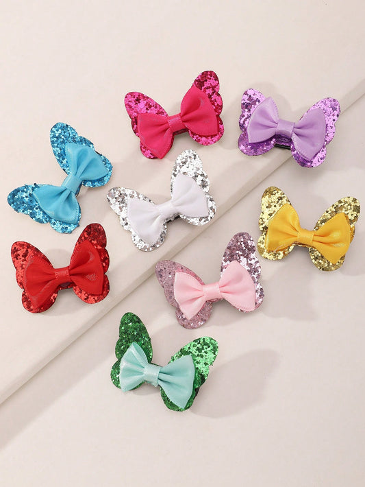 Add a touch of magic to your pet's style with our whimsical glitter butterfly bowknot hair clips. These clips not only add a unique accessory to your pet's look, but also hold hair in place for a tidy and fashionable appearance. Elevate your pet's style with these playful and functional clips.