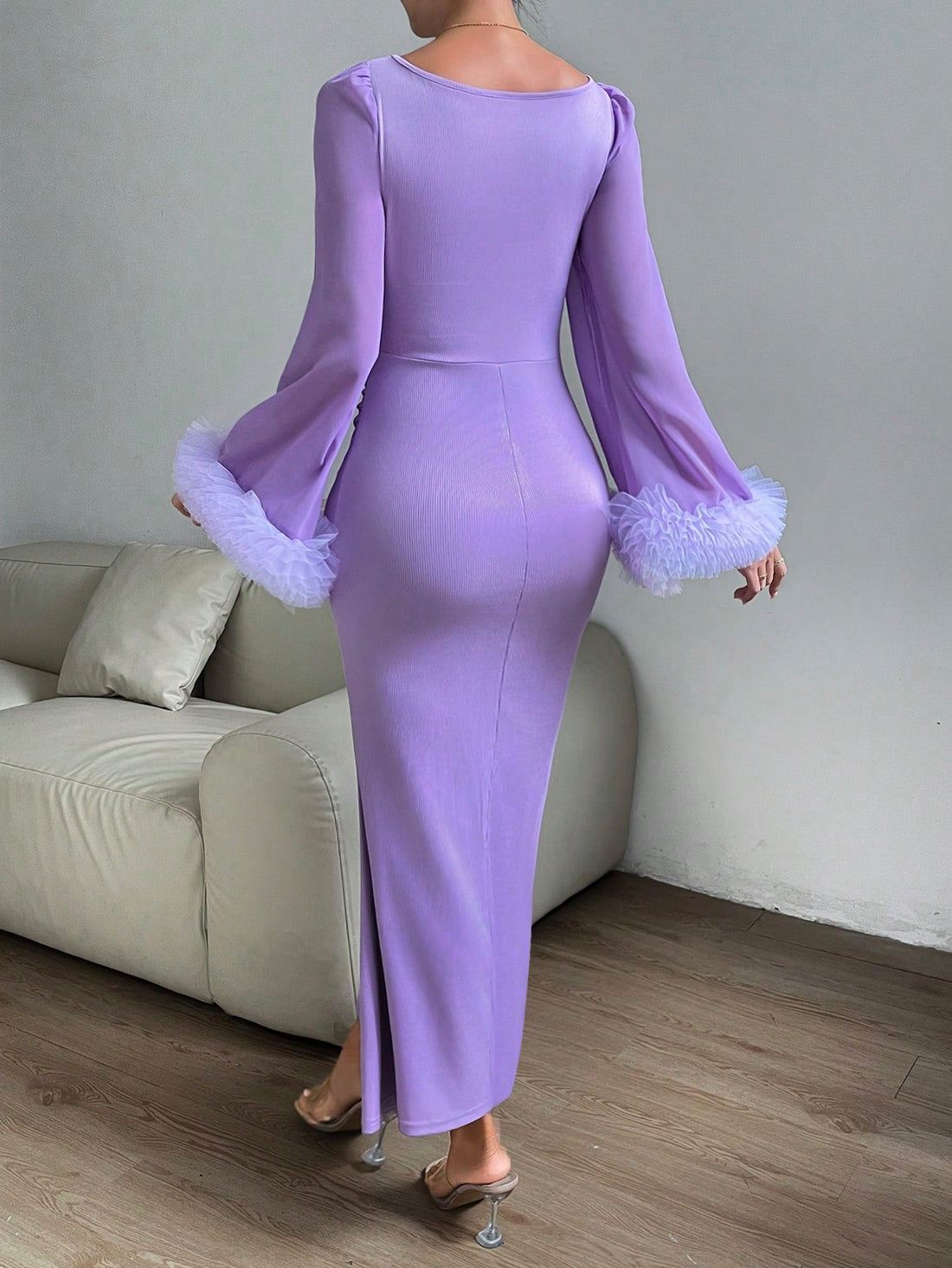 Unleash your inner elegance with our Purple Ruffle Trim Trumpet Sleeve Mermaid Hem Dress. This stunning dress exudes sophistication with its intricate details and figure-hugging silhouette. Perfect for any formal occasion, you'll feel confident and stylish in this dress. Upgrade your wardrobe today.
