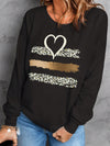 Bold & Stylish: Plus-Size Heart and Leopard Print Sweatshirt for a Trendy New Year!