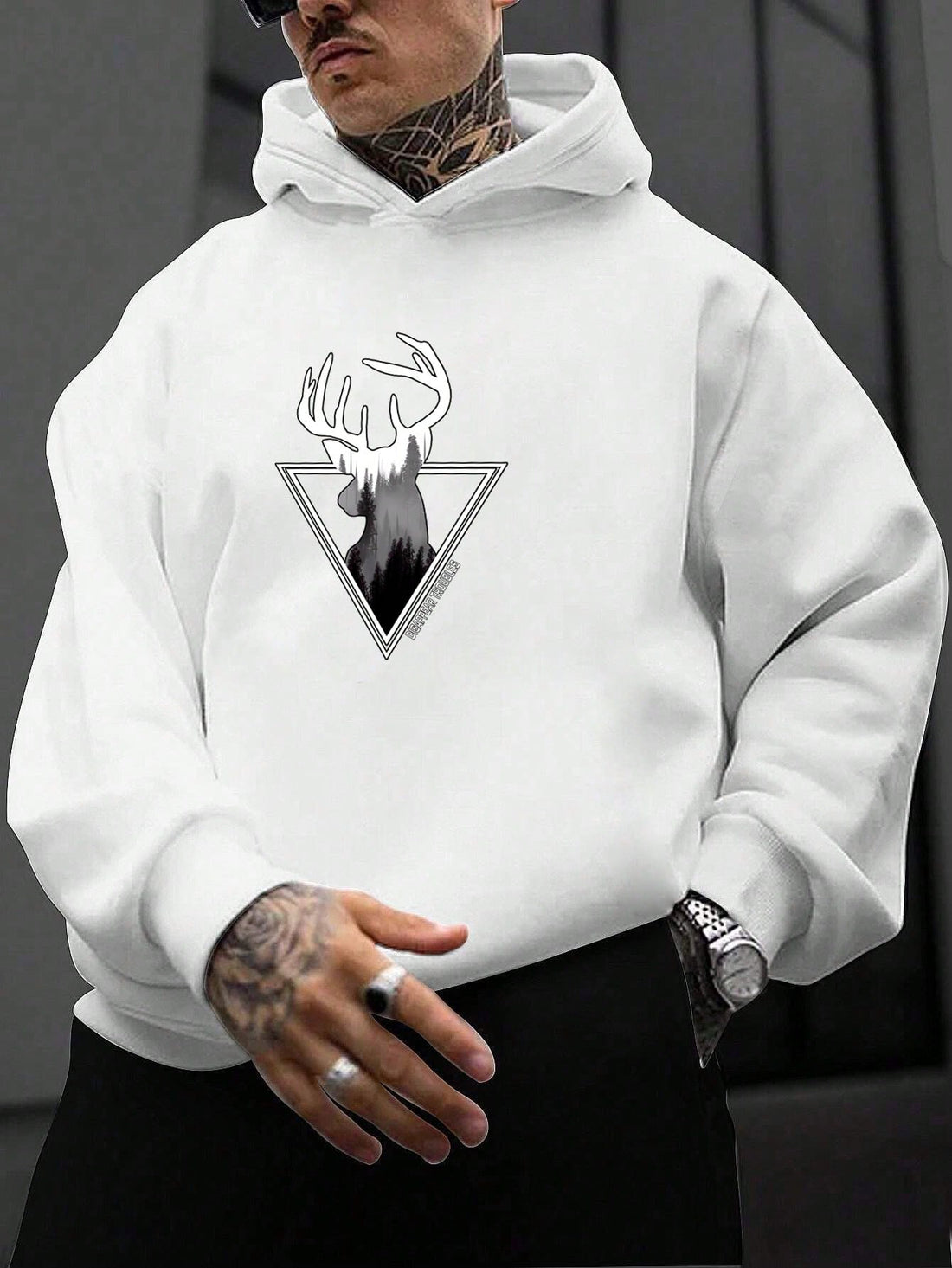 Introducing the Men's Deer Graphis Print Thermal-Lined Drop Shoulder Hoodie, designed for ultimate warmth and comfort. The thermal lining provides 30% more insulation, making it perfect for colder weather. The drop shoulder design allows for a relaxed fit and the deer graphic adds a touch of style.