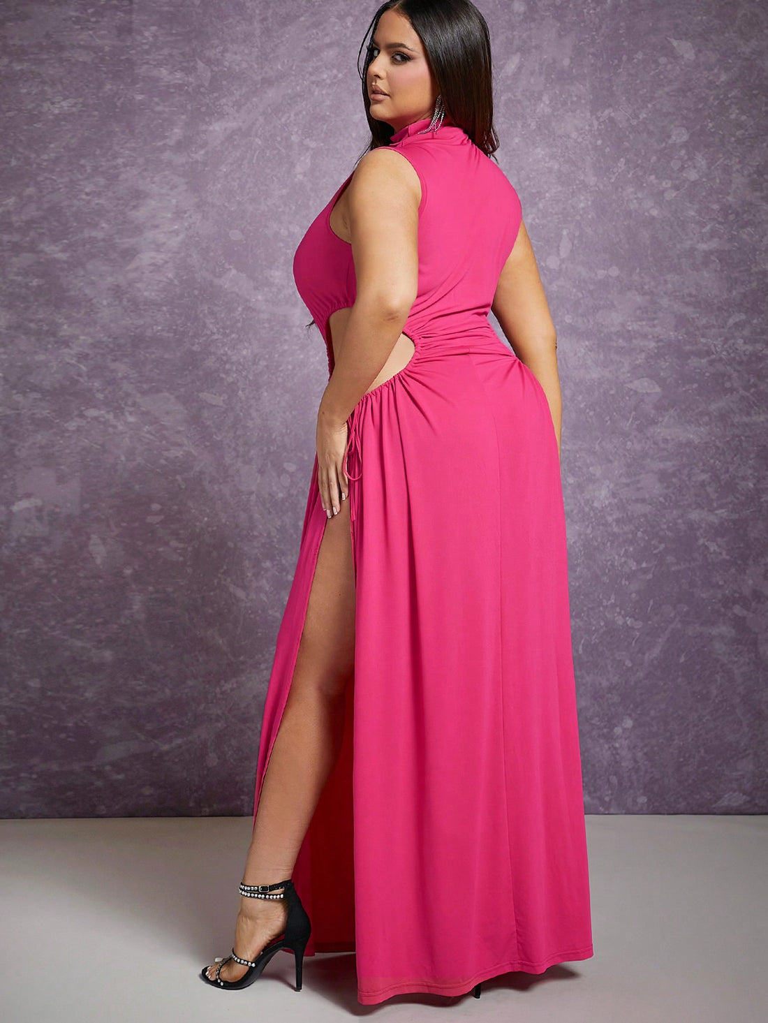 Step out in style with this Chic Plus High Neck Cut-Out Split Dress that combines bold design and comfort. The high neck adds a touch of sophistication while the playful cut-out delivers a flirty twist. Finished with a daring split, this dress lets you move with ease and confidence, perfect for turning heads wherever you go. Effortless elegance has never been this fun!