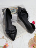 Low heel ballet flats with twisted vamp detail