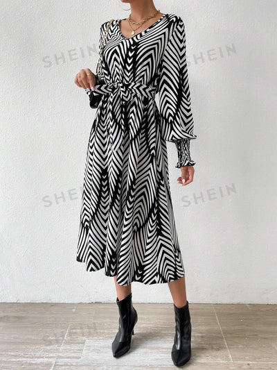 Floral Fantasy: V-neckline Shirred Long Sleeve Dress