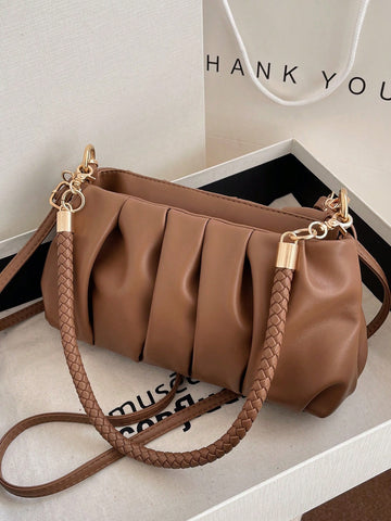 This Pleated Perfection Vintage Retro Single Shoulder Bag boasts a chic design and functional features. Perfect for carrying your essentials, it offers hands-free convenience and style. With its pleated details and single shoulder strap, it adds a touch of vintage charm to any outfit.