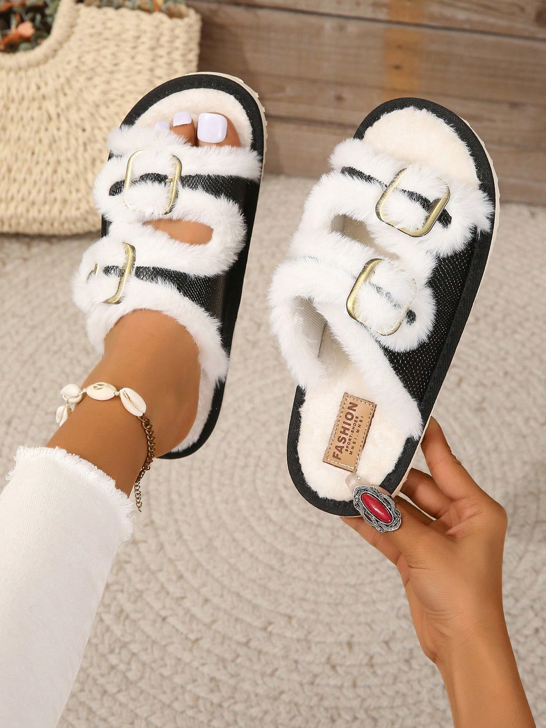 Introducing Cozy Comfort plush house slippers for women. With a secure buckle strap, these slippers provide maximum comfort and support for in-home wear. Enjoy cozy relaxation in style.