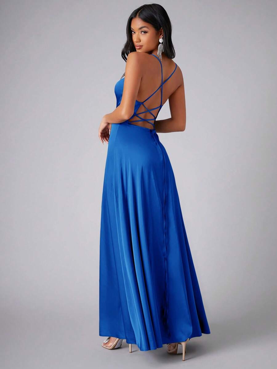 Back view of royal blue gown with open crisscross strap detail